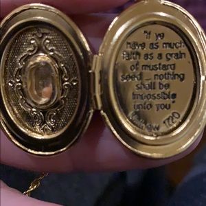 Gold tone locket w/ mustard seed inscription
